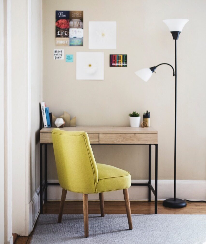 table, chair, desk, lamp, room, carpet, posters, picture stickers, chair, chair, desk, desk, desk, lamp, room, room, room, room, room