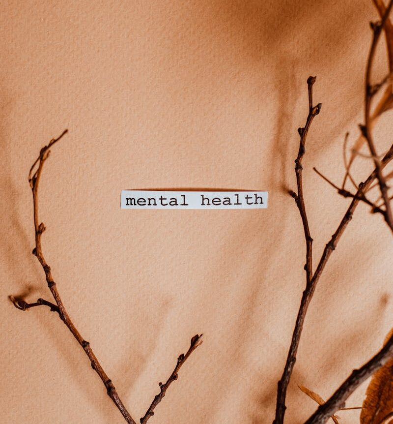 a pen and glasses on a notebook